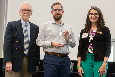 The Center for Teaching and Leanring presents Dr. Todd Fernandez with the Scholarship of Teaching and Learning Award during the 2023 Georgia Tech Faculty and Staff Honors Luncheon. 