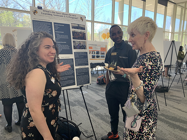 Faculty members present posters at Celebrating Teaching Day
