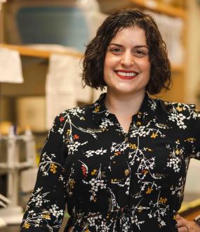 Photo of Jennifer Glass in a lab.